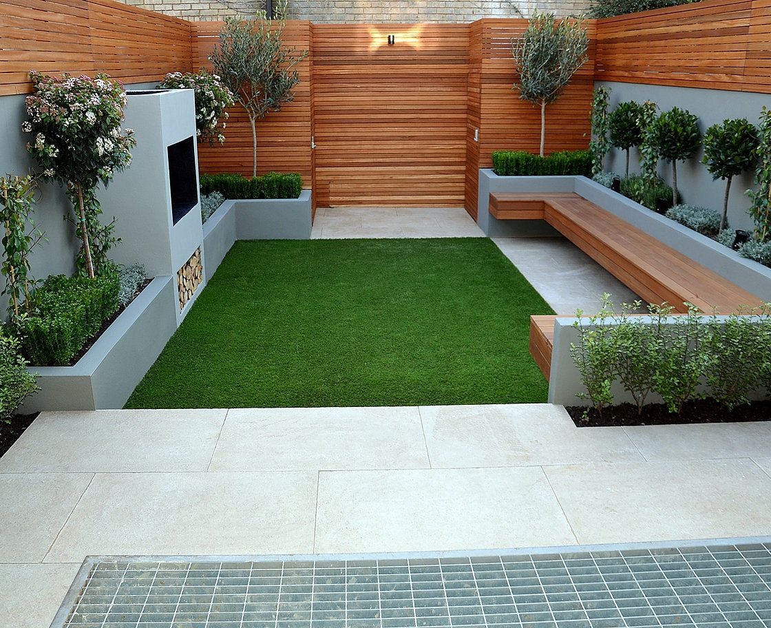 Jardim moderno com área para sentar e churrasqueira